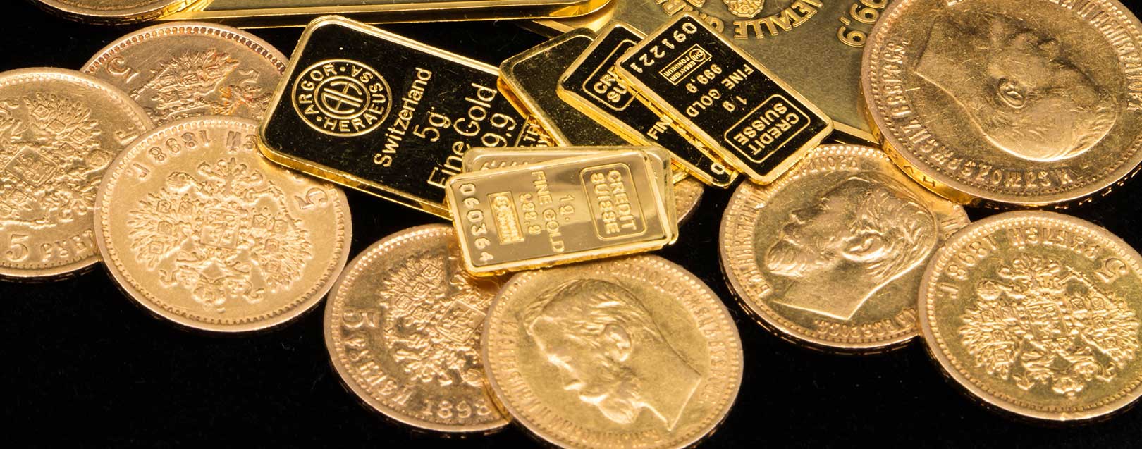 Gold hits 2-week low, global cues, subdued demand